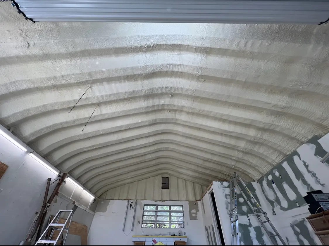 Spray polyurethane foam applied to the underside of a metal roof deck in Kissimmee